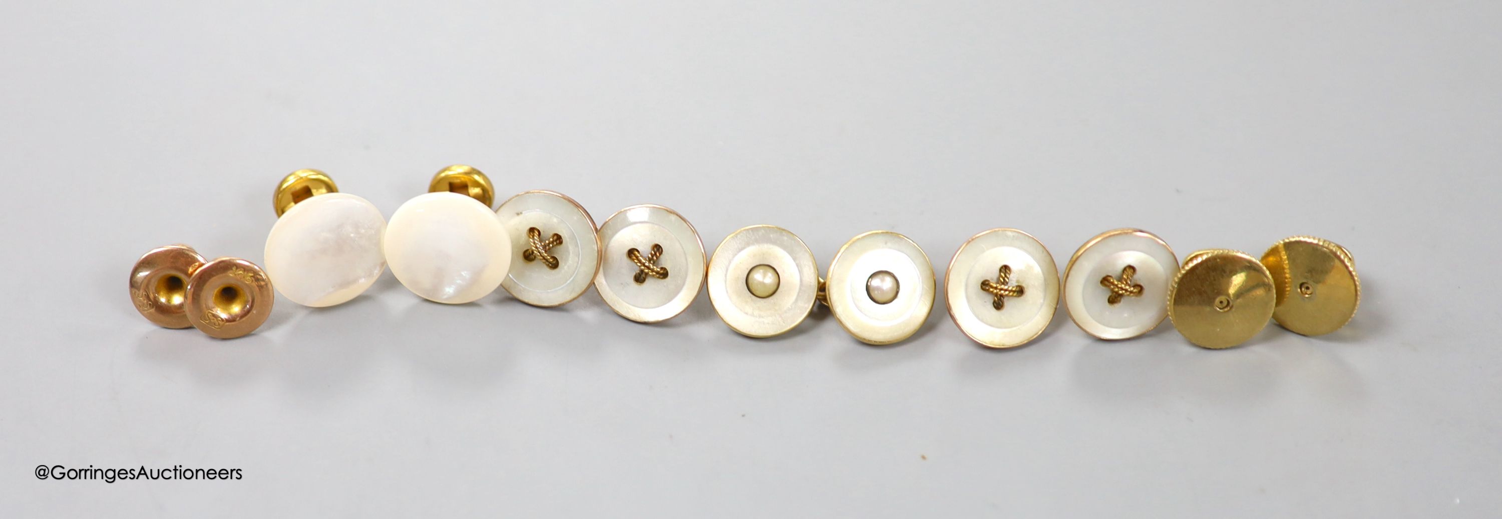 A small collection of assorted dress studs and buttons and cufflink, two stamped 9ct (1.1. grams).
